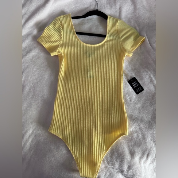 Express Tops - Express women’s Ribbed Short-Sleeve One-Piece Bodysuit in Yellow